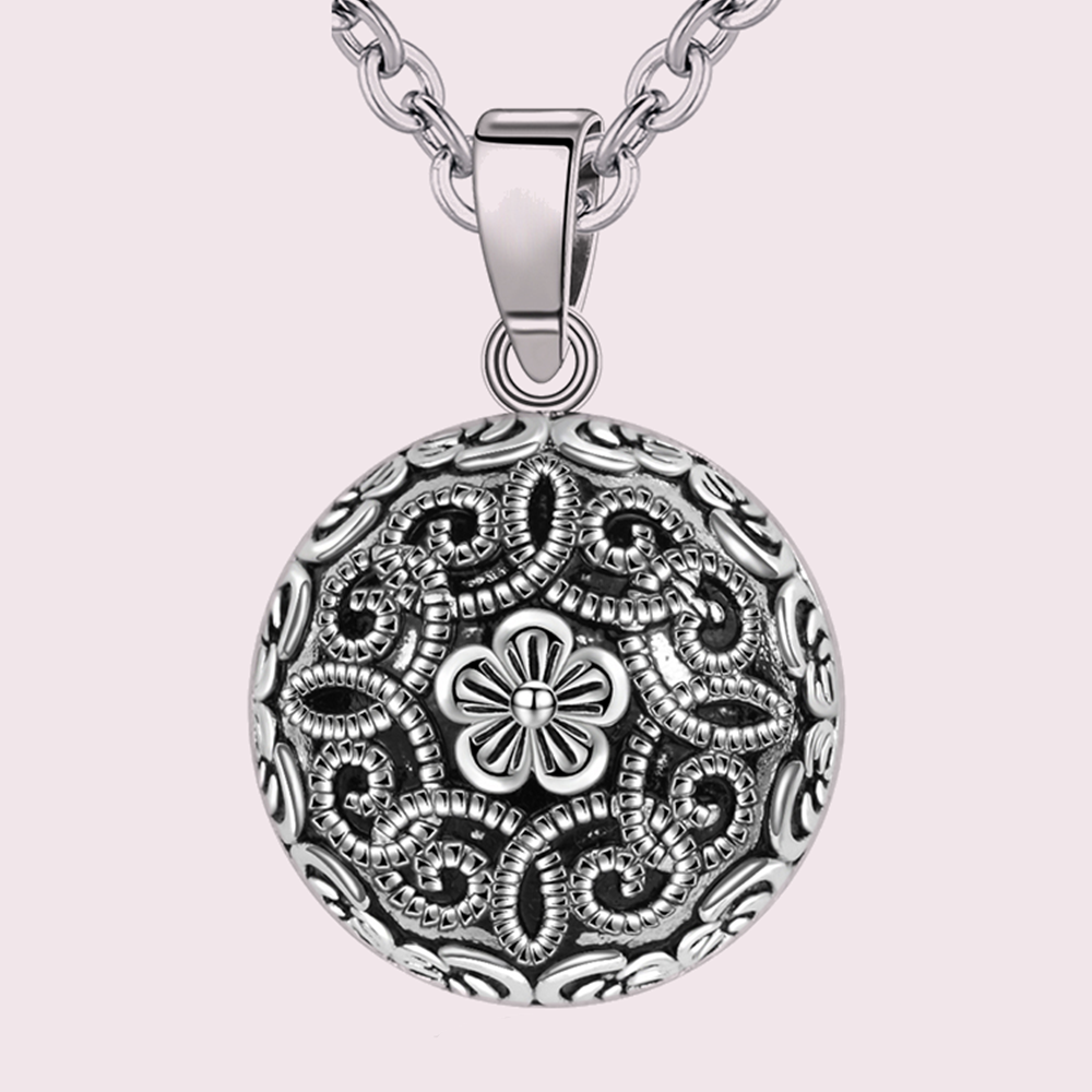 Bola de grossesse vintage fleur et arabesques, finition vieil argent