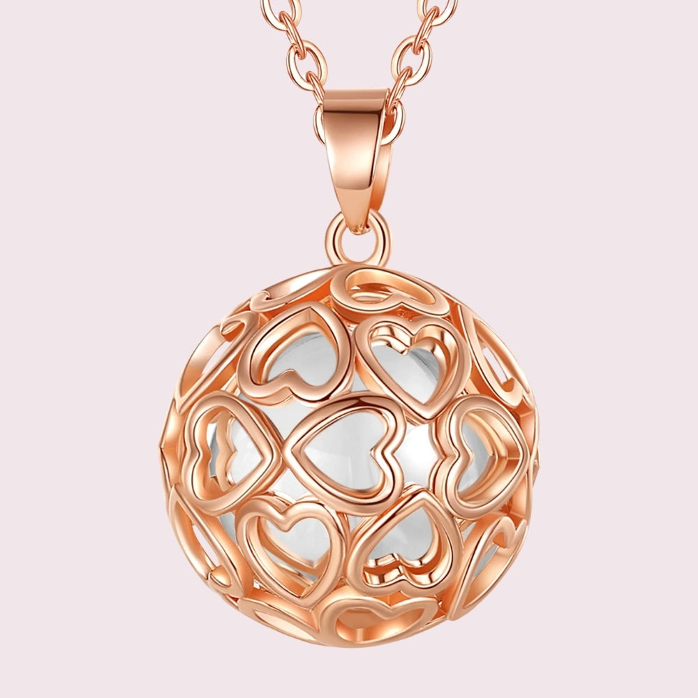 Bola de grossesse cœur ajouré or rose