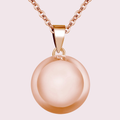Bola de grossesse lisse or rose sur chaîne longue